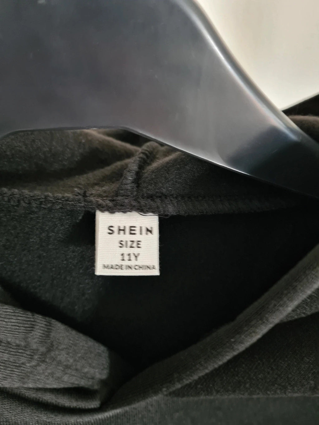 Shein kids girls 11y solid black hoodie with white bow everyday wear soft comfy