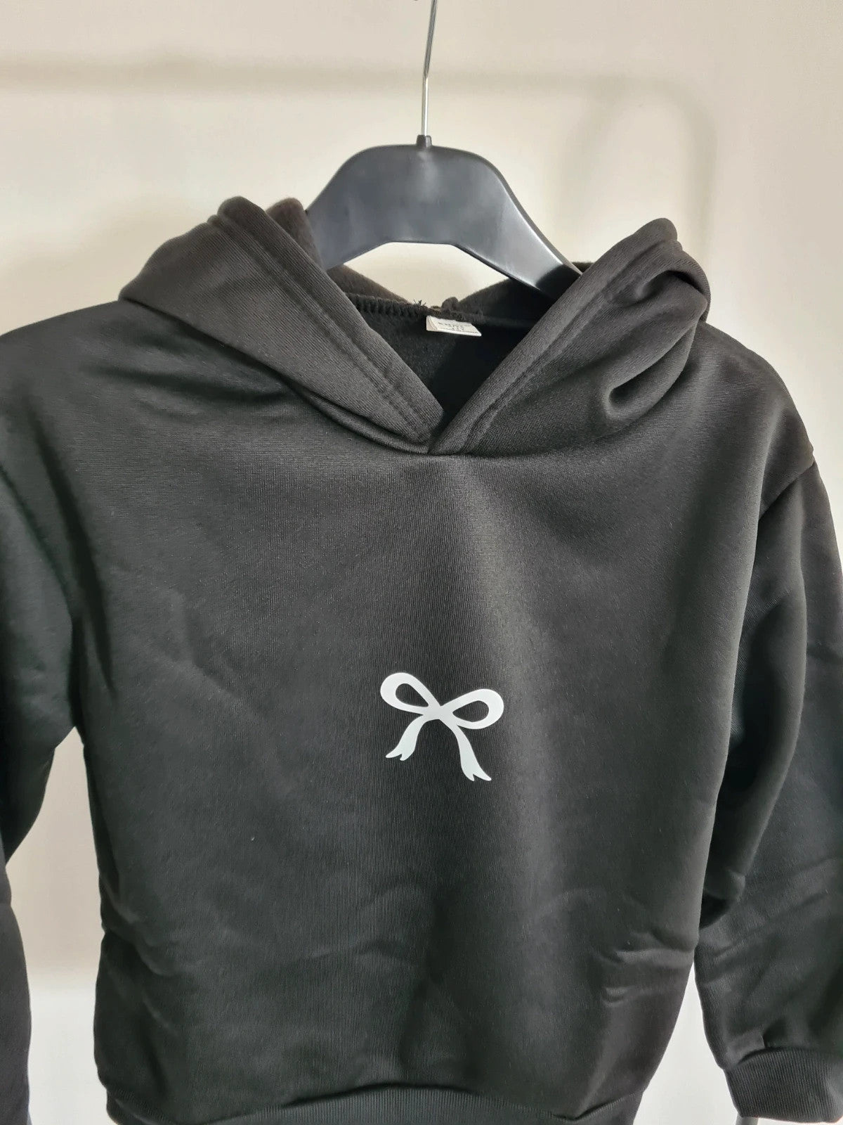 Shein kids girls 11y solid black hoodie with white bow everyday wear soft comfy