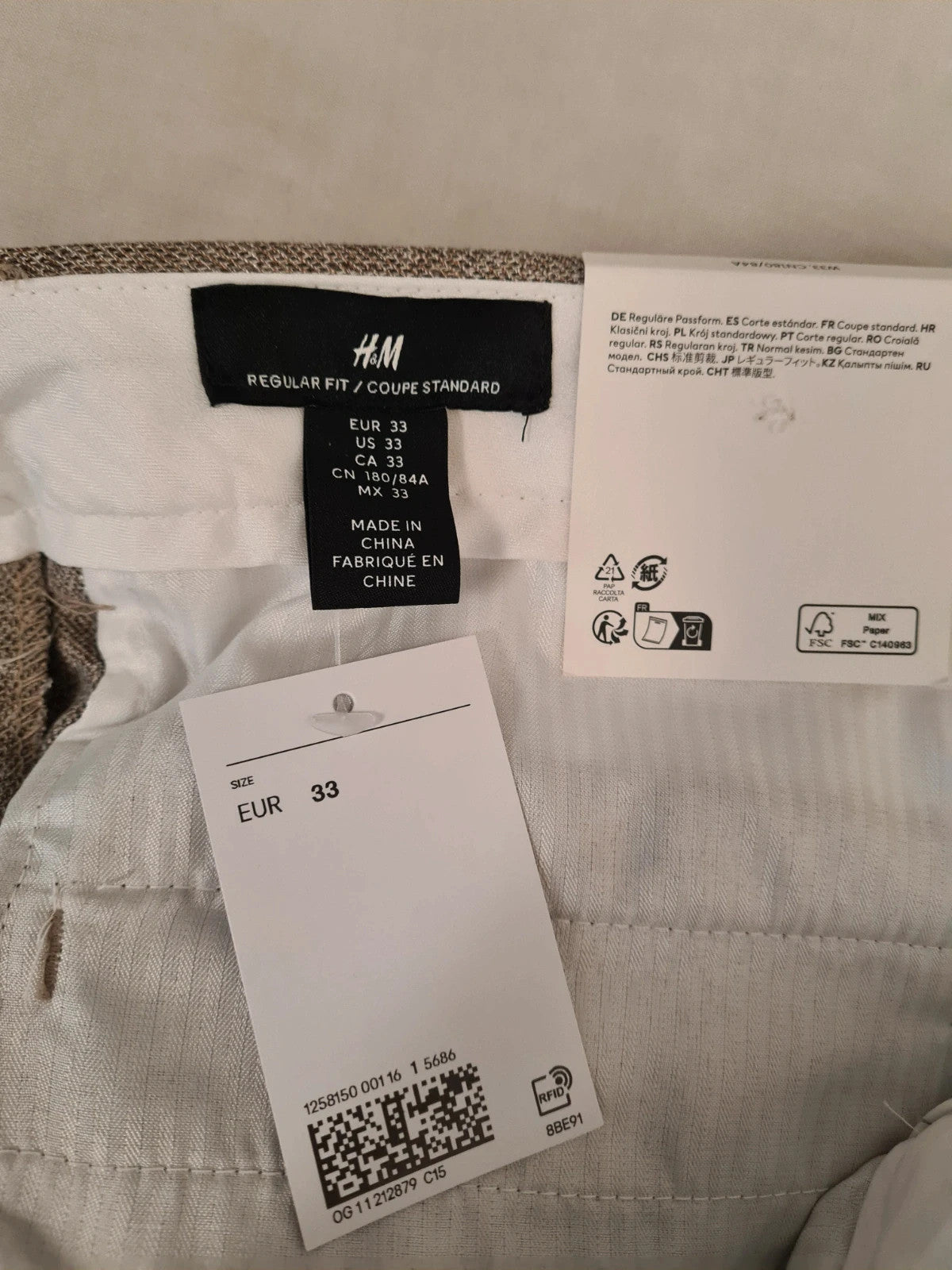 H&M men beige regular fit tailored suit trousers tapered straight leg turn up hems pockets W33/M