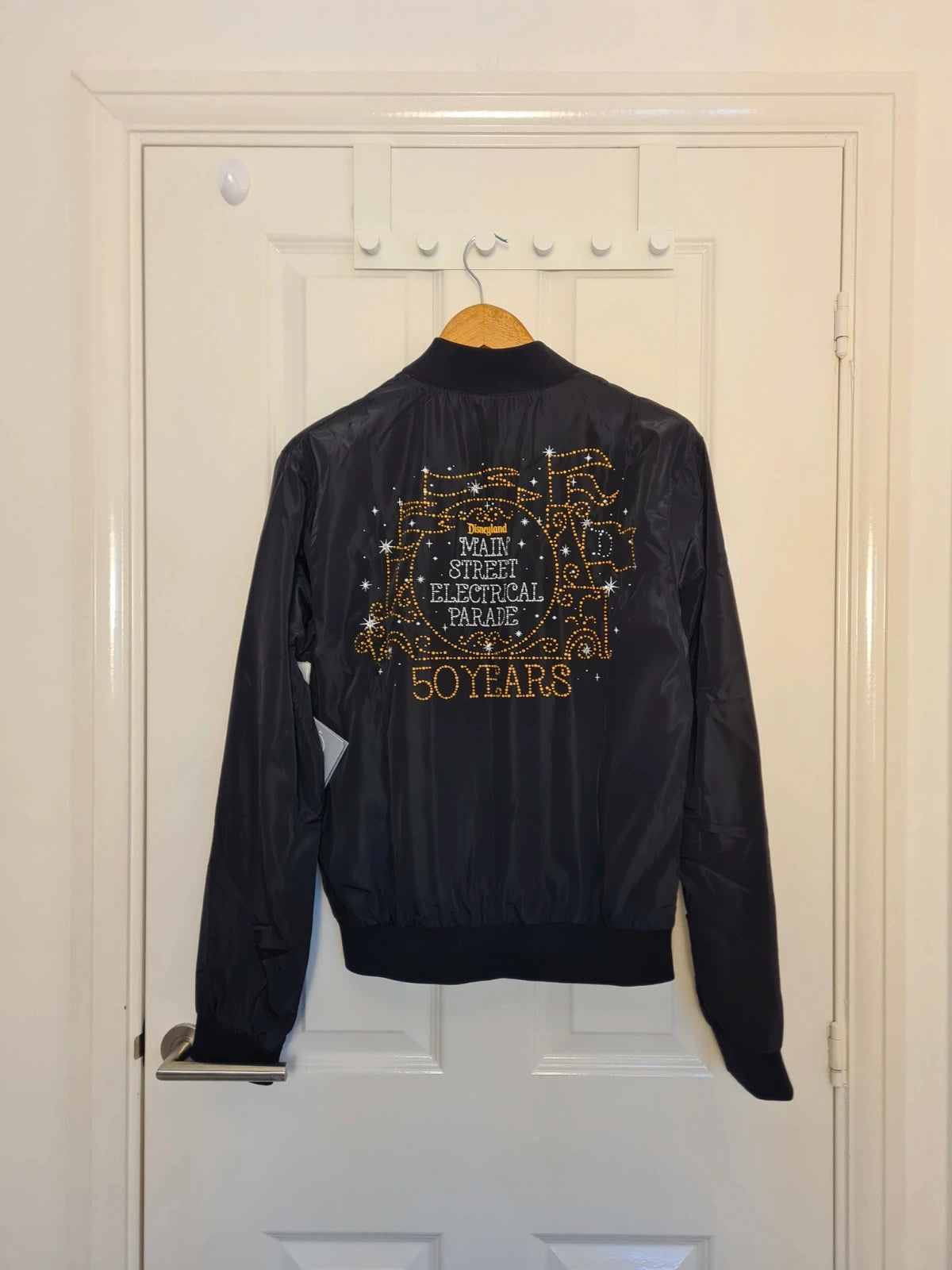 Disney unisex black Main Street electrical parade 50y light up windbreaker jacket varsity bomber XS