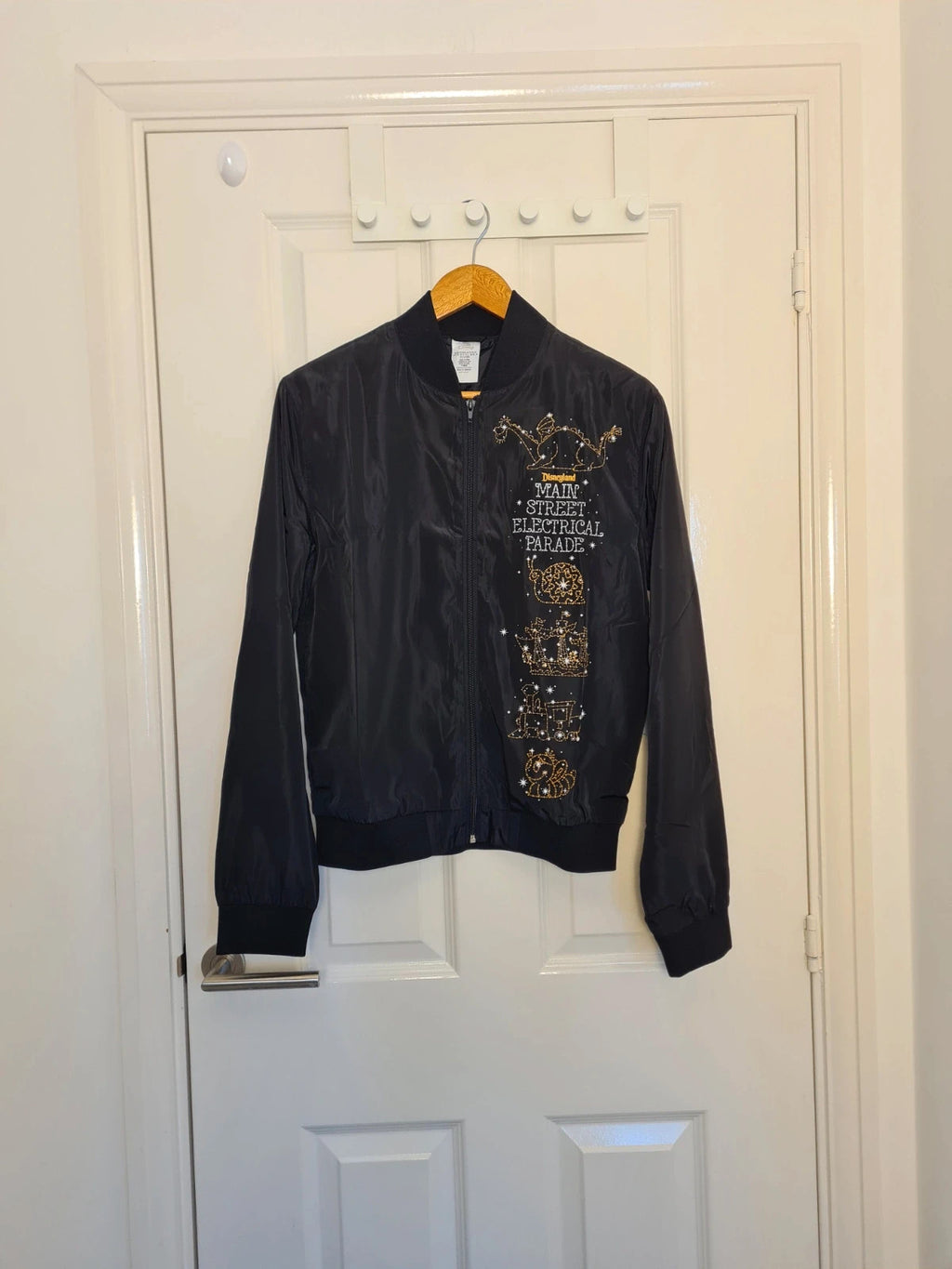 Disney unisex black Main Street electrical parade 50y light up windbreaker jacket varsity bomber XS