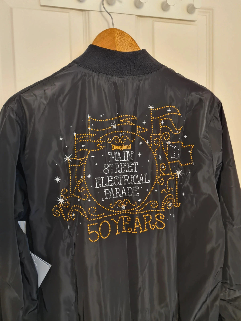 Disney unisex black Main Street electrical parade 50y light up windbreaker jacket varsity bomber XS