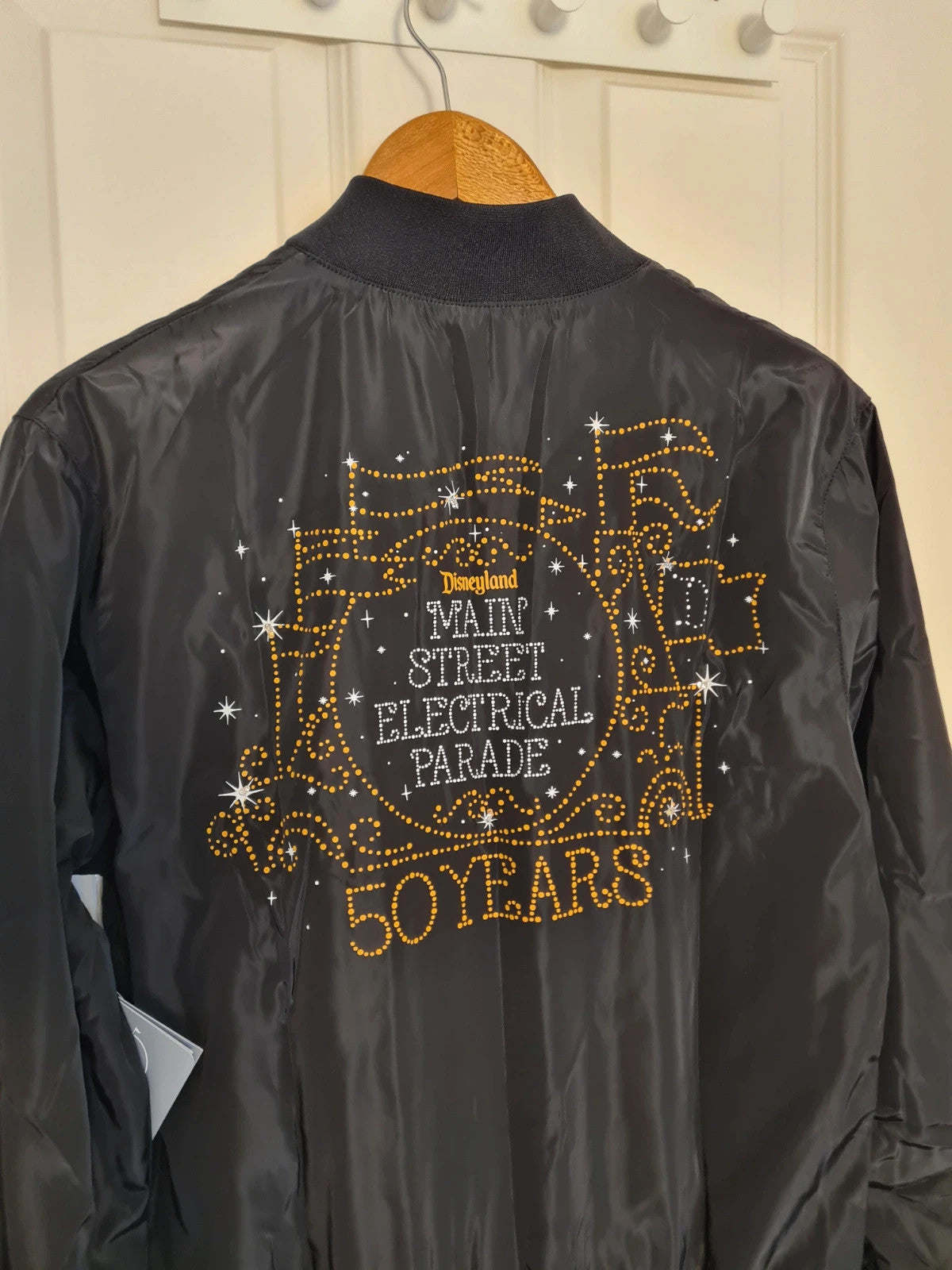 Disney unisex black Main Street electrical parade 50y light up windbreaker jacket varsity bomber XS