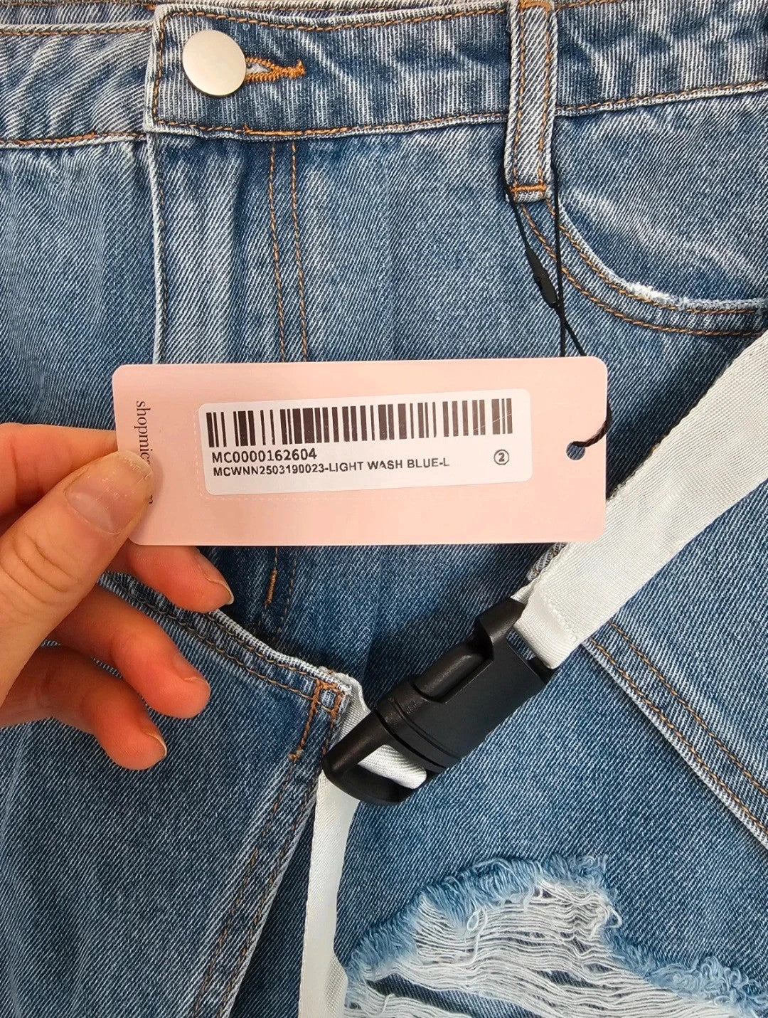 Micas denim asymmetrical ripped frayed mini skirt women belted light wash blue summer party L/12