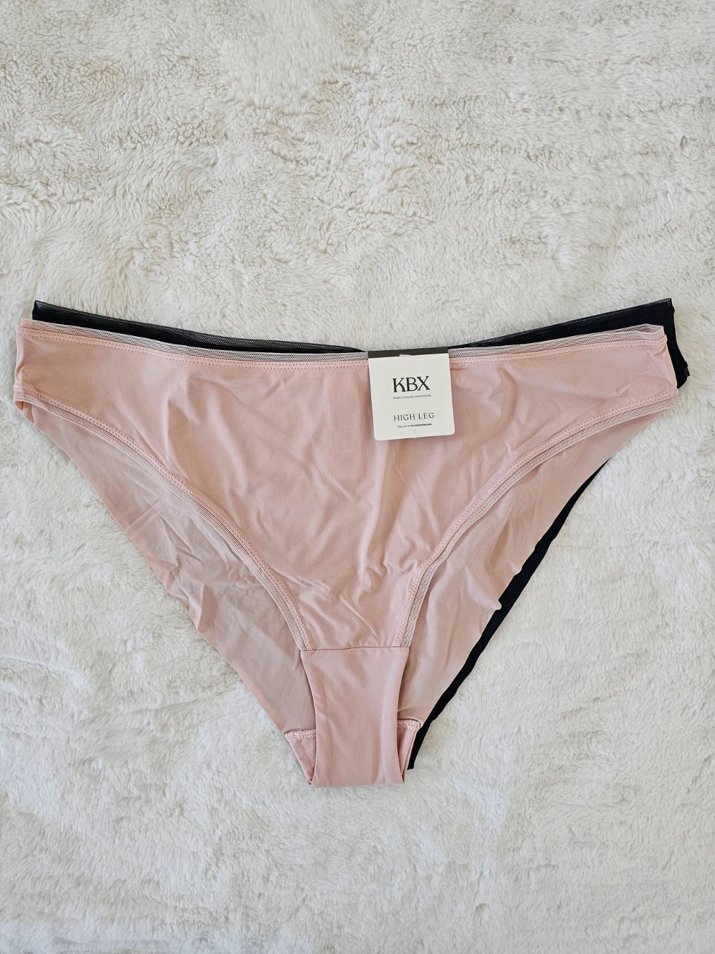 Knickerbox beige and black lace high leg briefs with seamless design and tag.