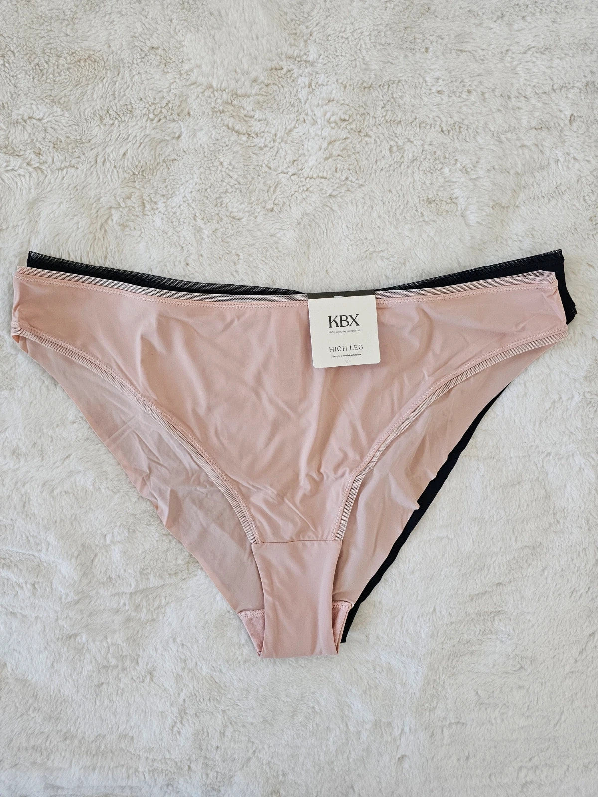 Knickerbox beige and black lace high leg briefs with seamless design and tag.