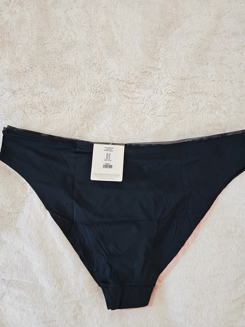 Knickerbox beige and black lace high leg briefs with seamless design and tag.