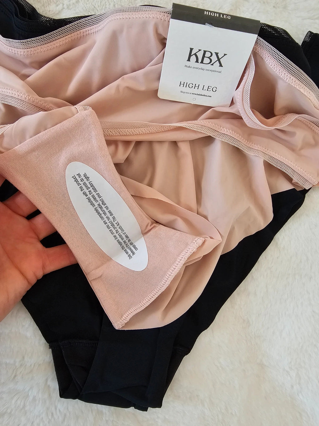 Knickerbox beige and black lace high leg briefs with seamless design and tag.