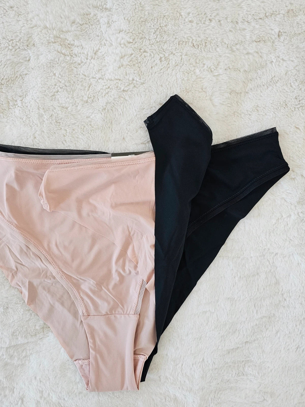 Knickerbox beige and black lace high leg briefs with seamless design and tag.