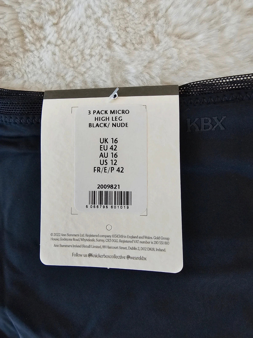 Knickerbox beige and black lace high leg briefs with seamless design and tag.