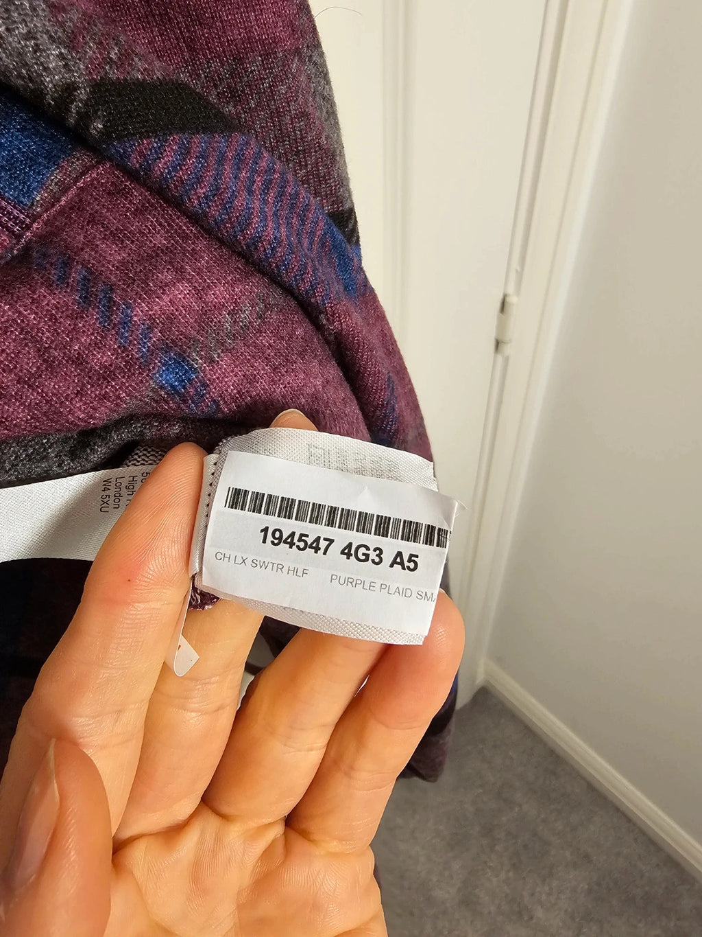 Carole Hochman purple and blue plaid poncho half-zip sweater with kangaroo pocket and batwing sleeves.