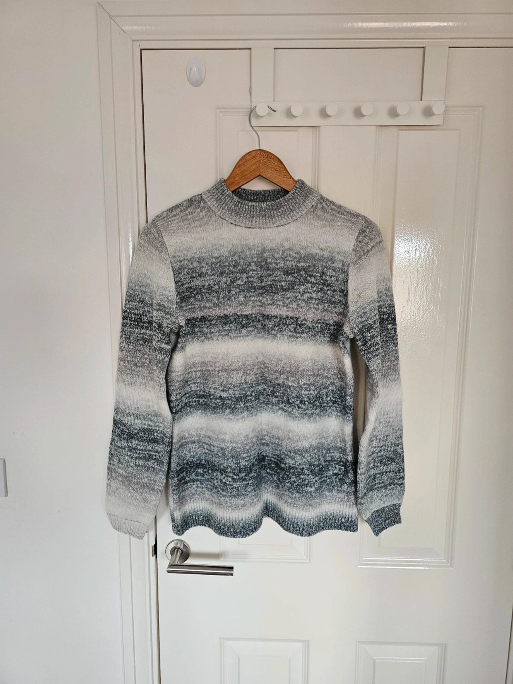 D&Co. grey and white chunky knit jumper with tonal stripes and mock neck.