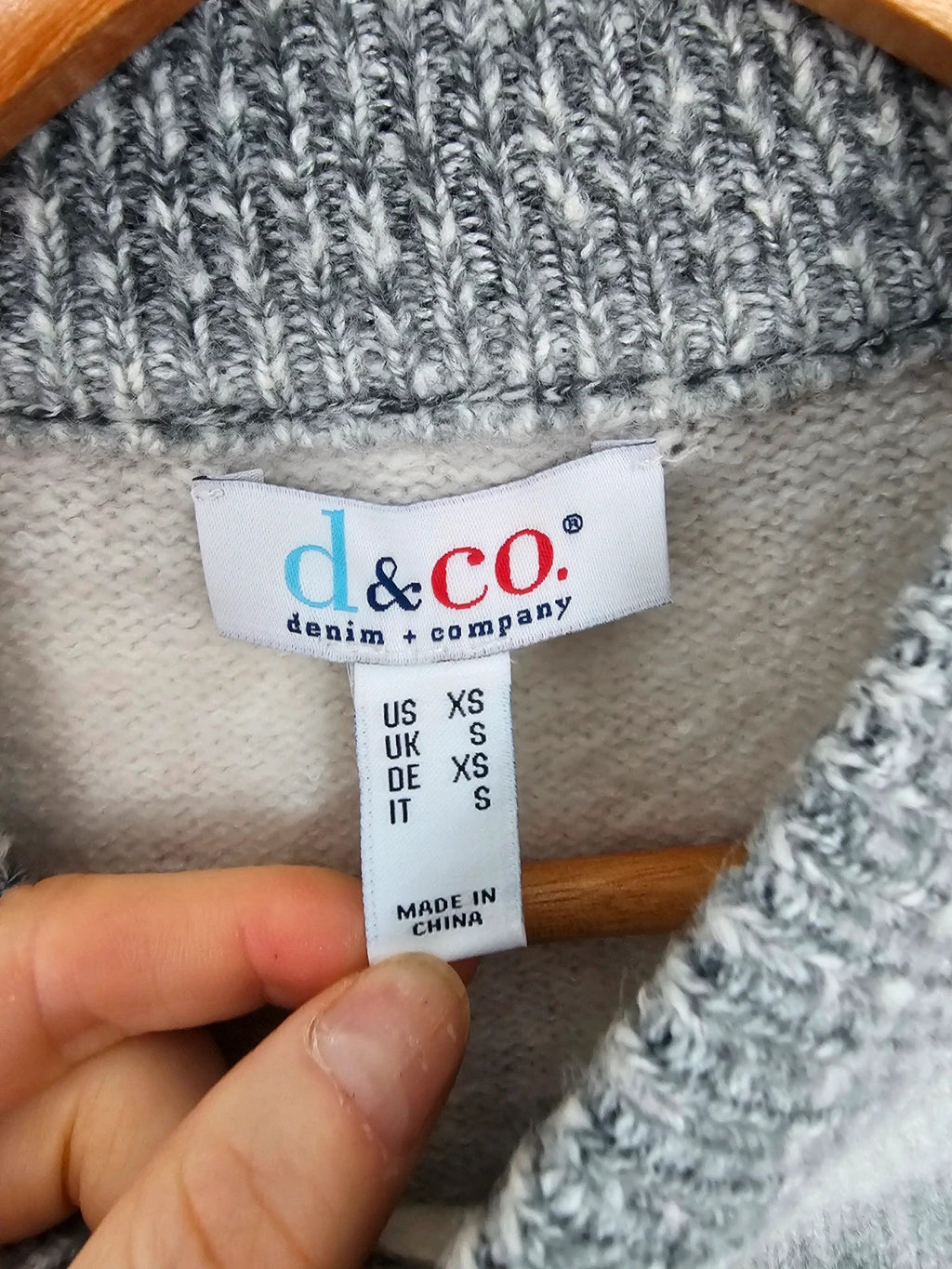 D&Co. grey and white chunky knit jumper with tonal stripes and mock neck.