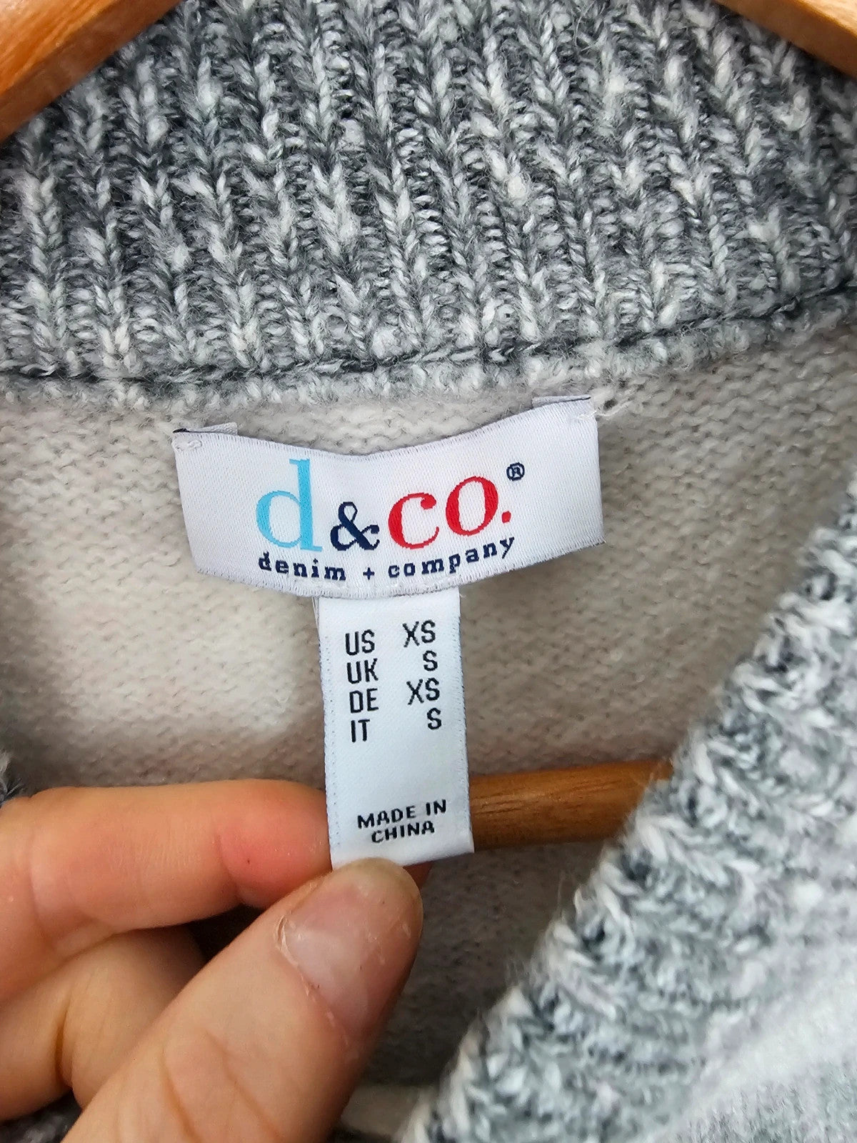 D&Co. grey and white chunky knit jumper with tonal stripes and mock neck.