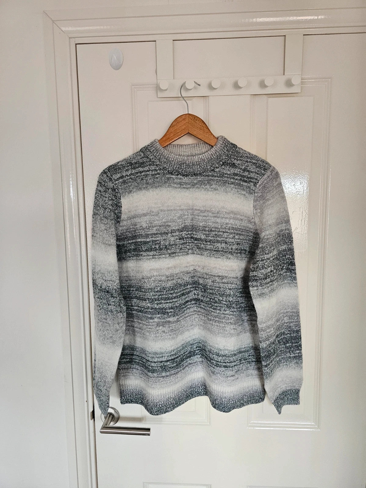 D&Co. grey and white chunky knit jumper with tonal stripes and mock neck.