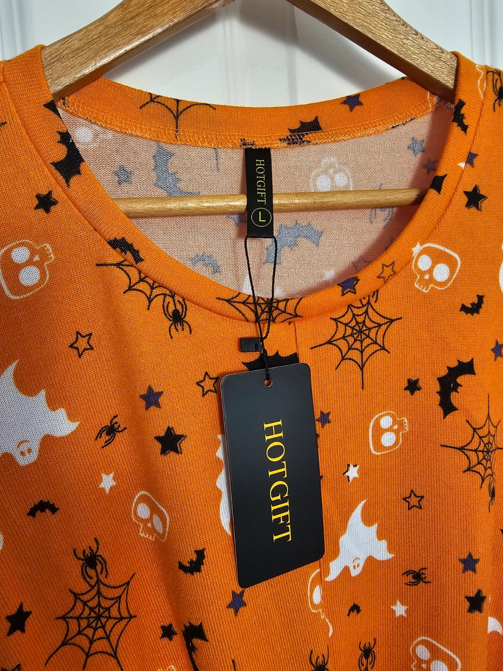Hot Gift black and orange Halloween jumper with spider ghost skull print and twist hem.