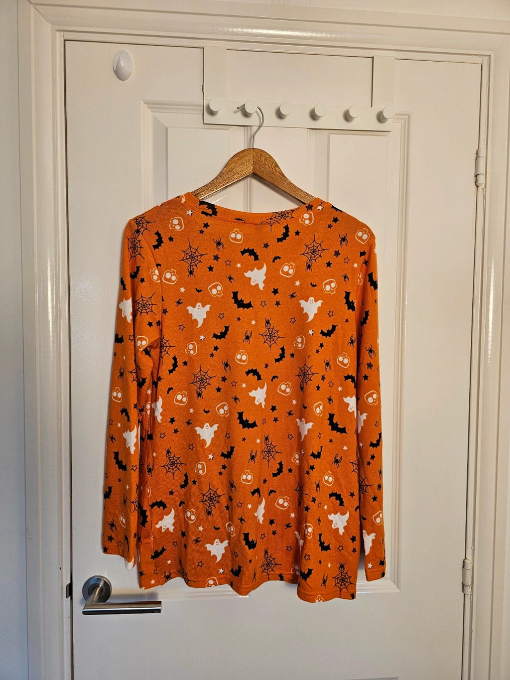 Hot Gift black and orange Halloween jumper with spider ghost skull print and twist hem.