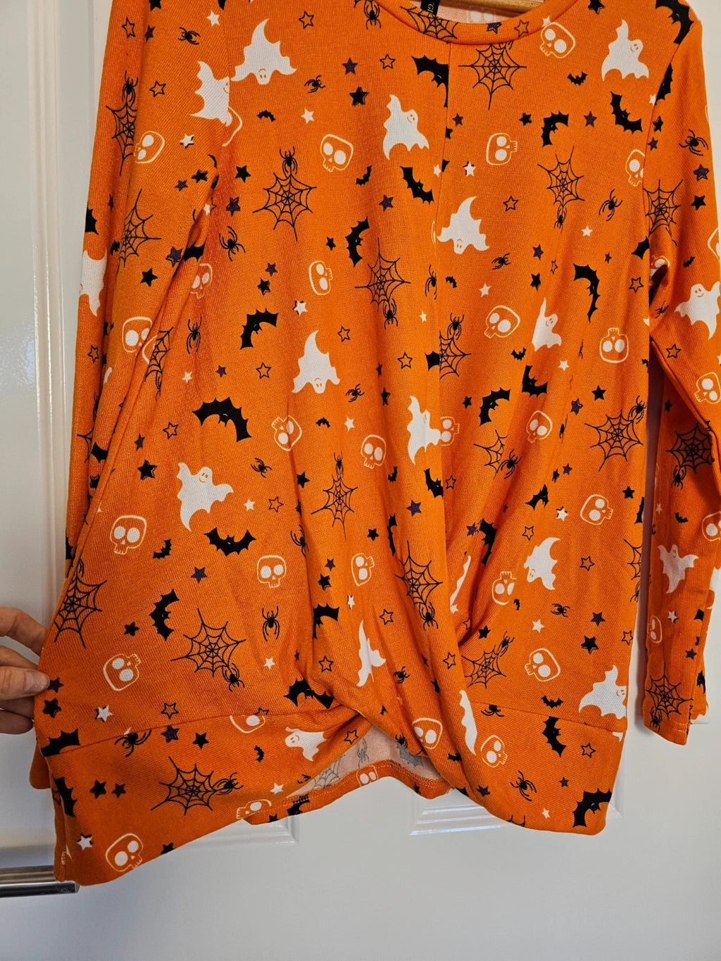 Hot Gift black and orange Halloween jumper with spider ghost skull print and twist hem.
