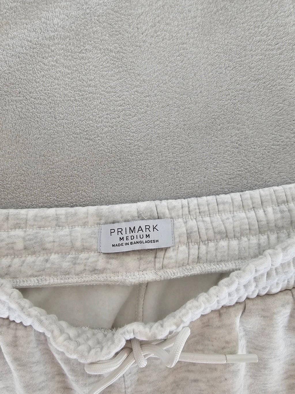 Primark grey and white joggers, regular fit, cotton blend, casual lounge style.