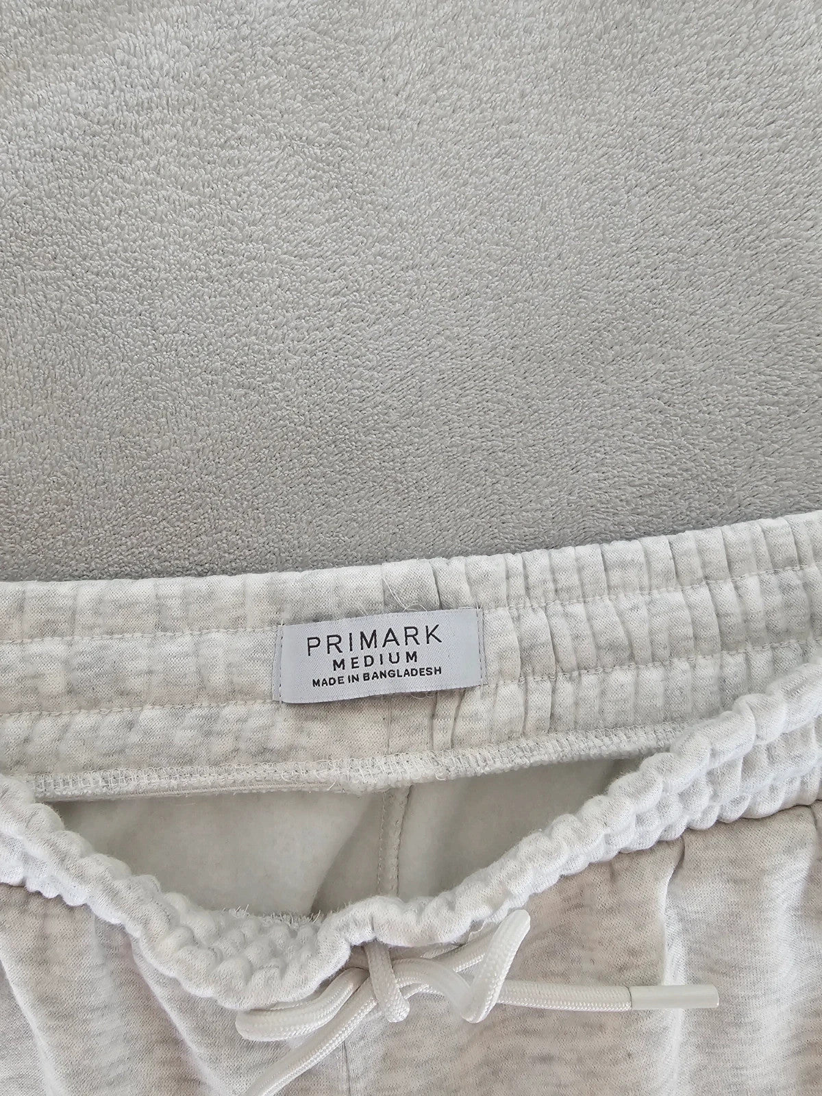 Primark grey and white joggers, regular fit, cotton blend, casual lounge style.