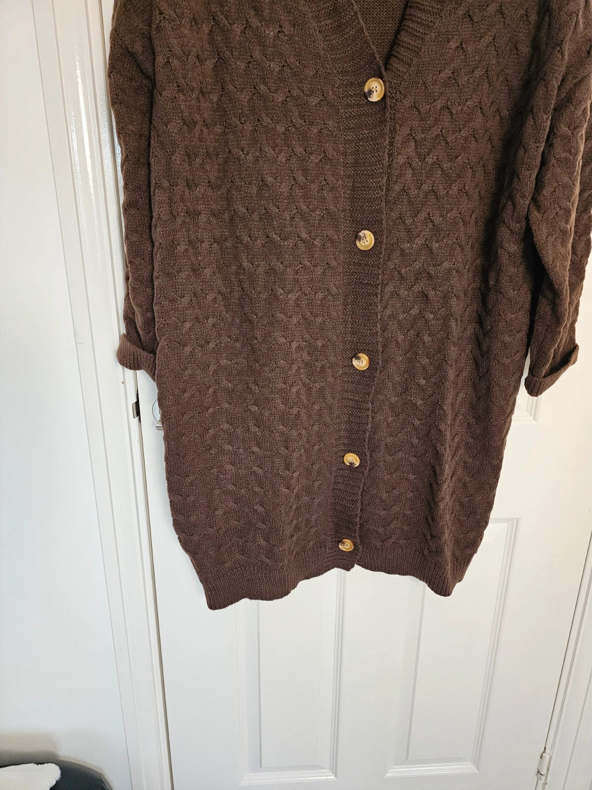 Shein Curve brown knit cardigan with drop shoulders, long sleeves, and button details.