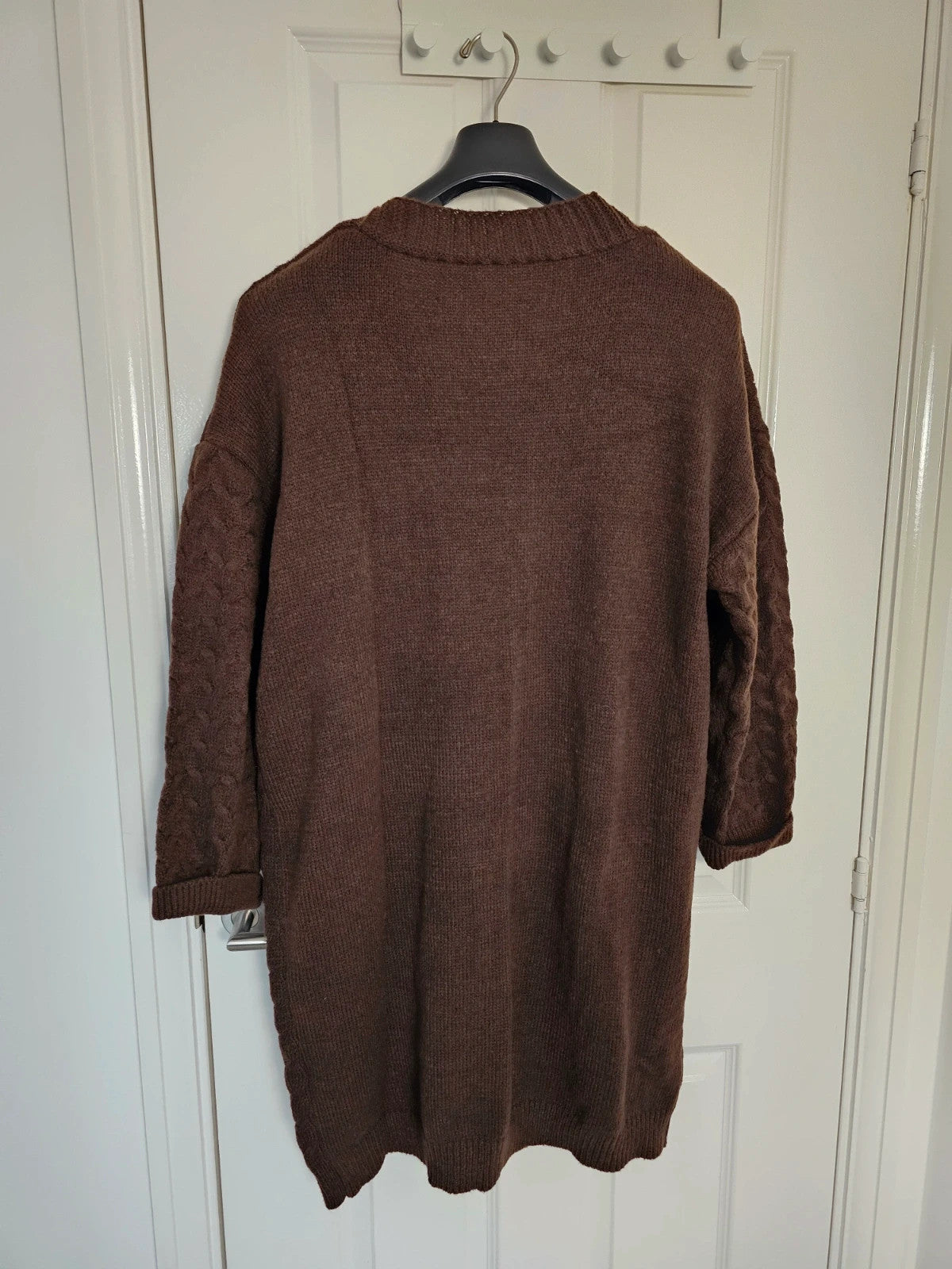 Shein Curve brown knit cardigan with drop shoulders, long sleeves, and button details.