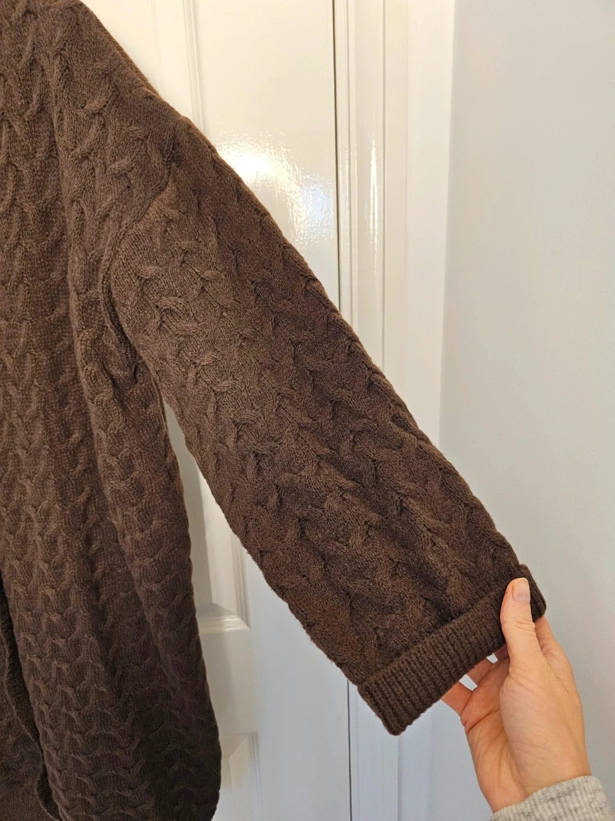 Shein Curve brown knit cardigan with drop shoulders, long sleeves, and button details.