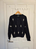 SHEIN black knit jumper with pearl studs and crew neck design.