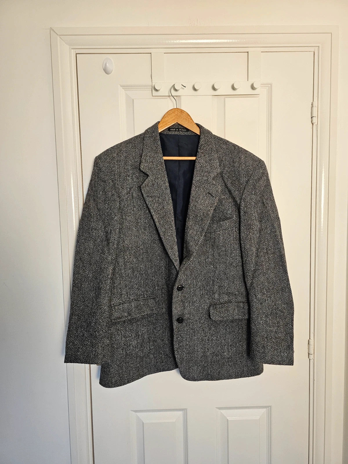 Harris Tweed grey herringbone wool jacket vintage handwoven blazer with subtle detailing.