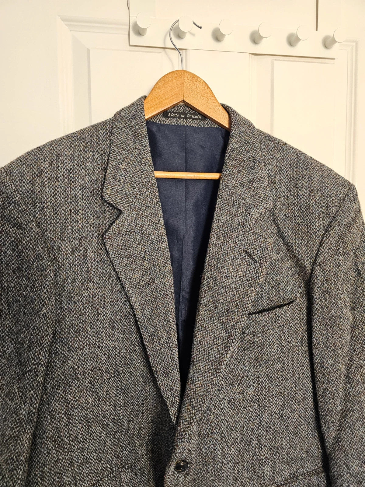 Harris Tweed grey herringbone wool jacket vintage handwoven blazer with subtle detailing.