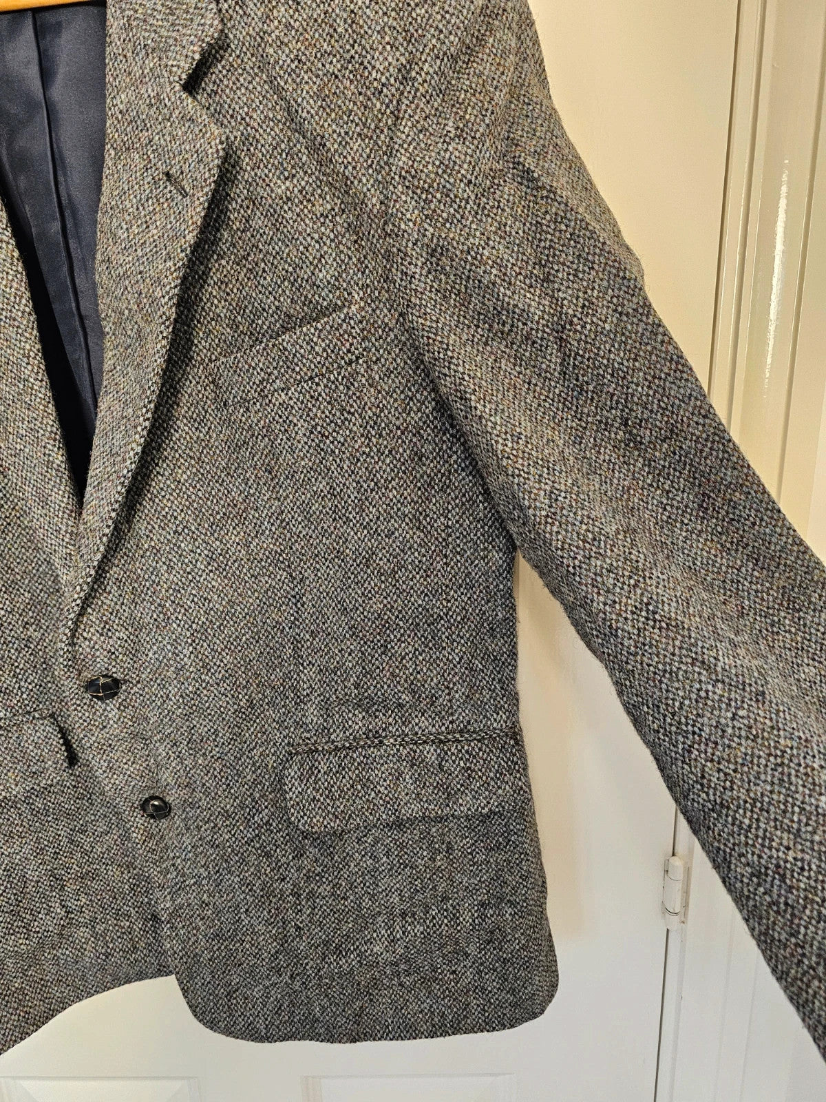 Harris Tweed grey herringbone wool jacket vintage handwoven blazer with subtle detailing.