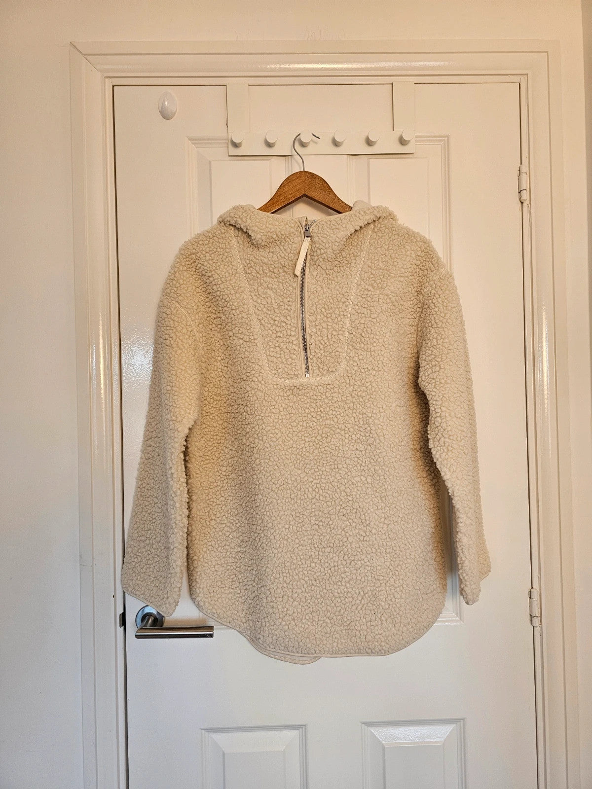 H&M cream oversized fleece teddy jacket with drop shoulder and 1/4 zip detail.