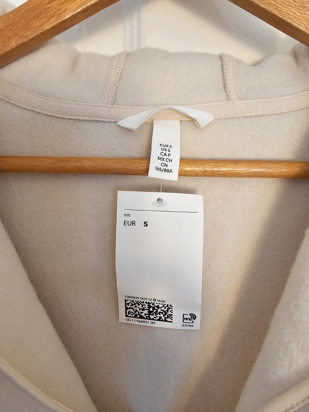 H&M cream oversized fleece teddy jacket with drop shoulder and 1/4 zip detail.
