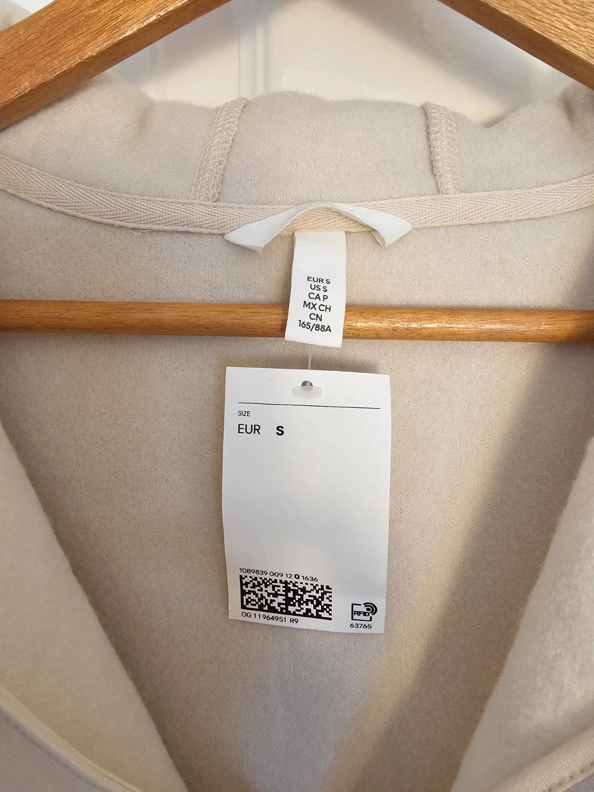 H&M cream oversized fleece teddy jacket with drop shoulder and 1/4 zip detail.