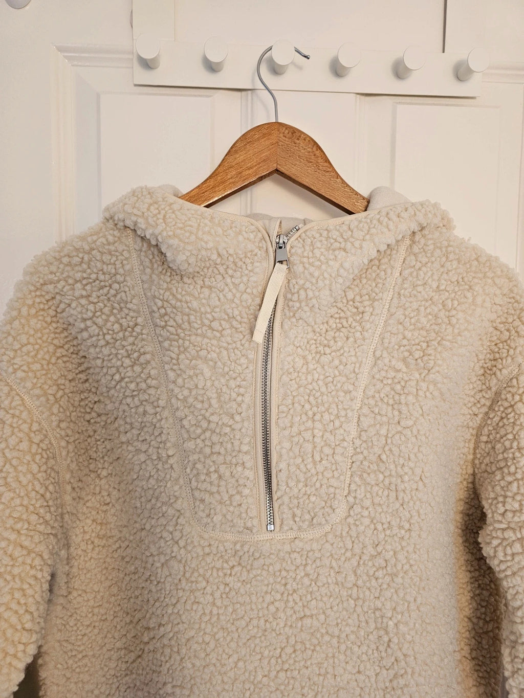 H&M cream oversized fleece teddy jacket with drop shoulder and 1/4 zip detail.