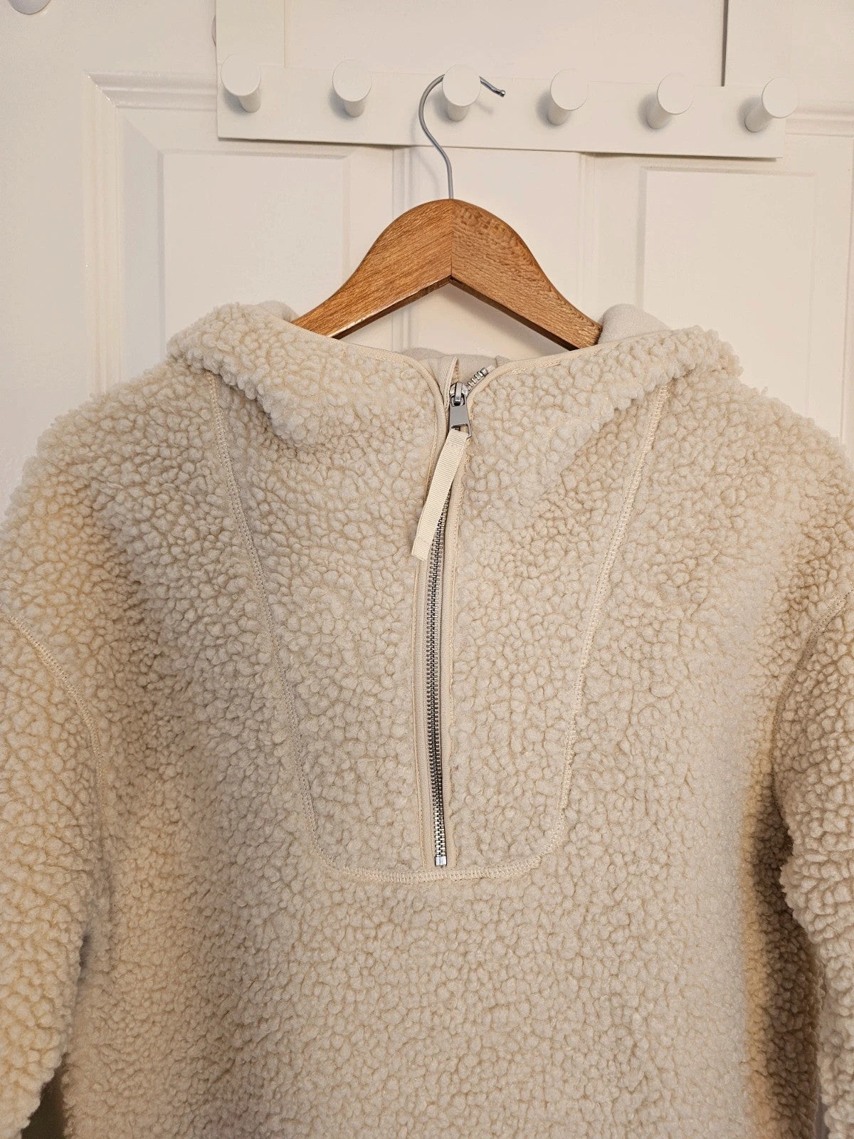 H&M cream oversized fleece teddy jacket with drop shoulder and 1/4 zip detail.