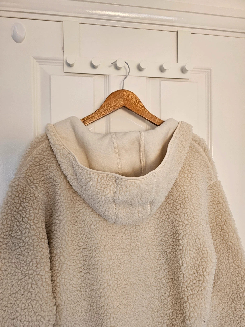 H&M cream oversized fleece teddy jacket with drop shoulder and 1/4 zip detail.