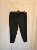 Amazon Essentials black joggers cotton blend with elastic waistband and side pockets.