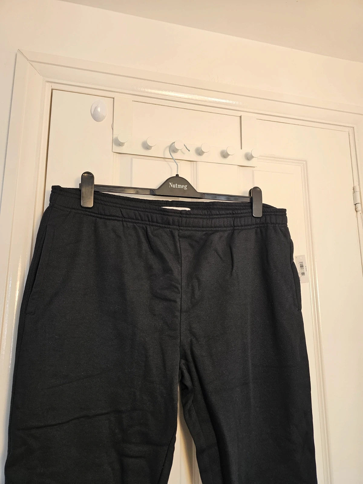 Amazon Essentials black joggers cotton blend with elastic waistband and side pockets.