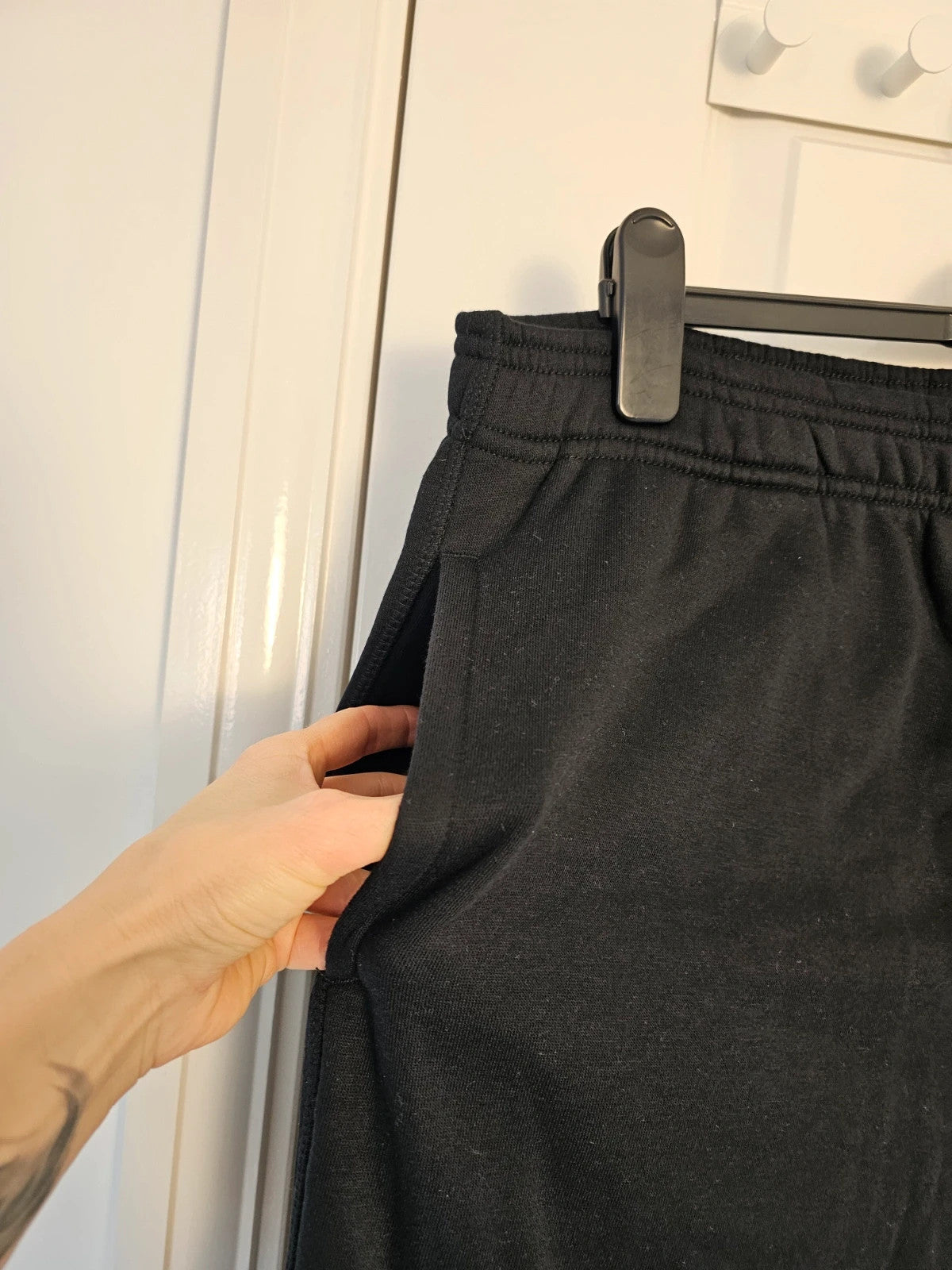 Amazon Essentials black joggers cotton blend with elastic waistband and side pockets.