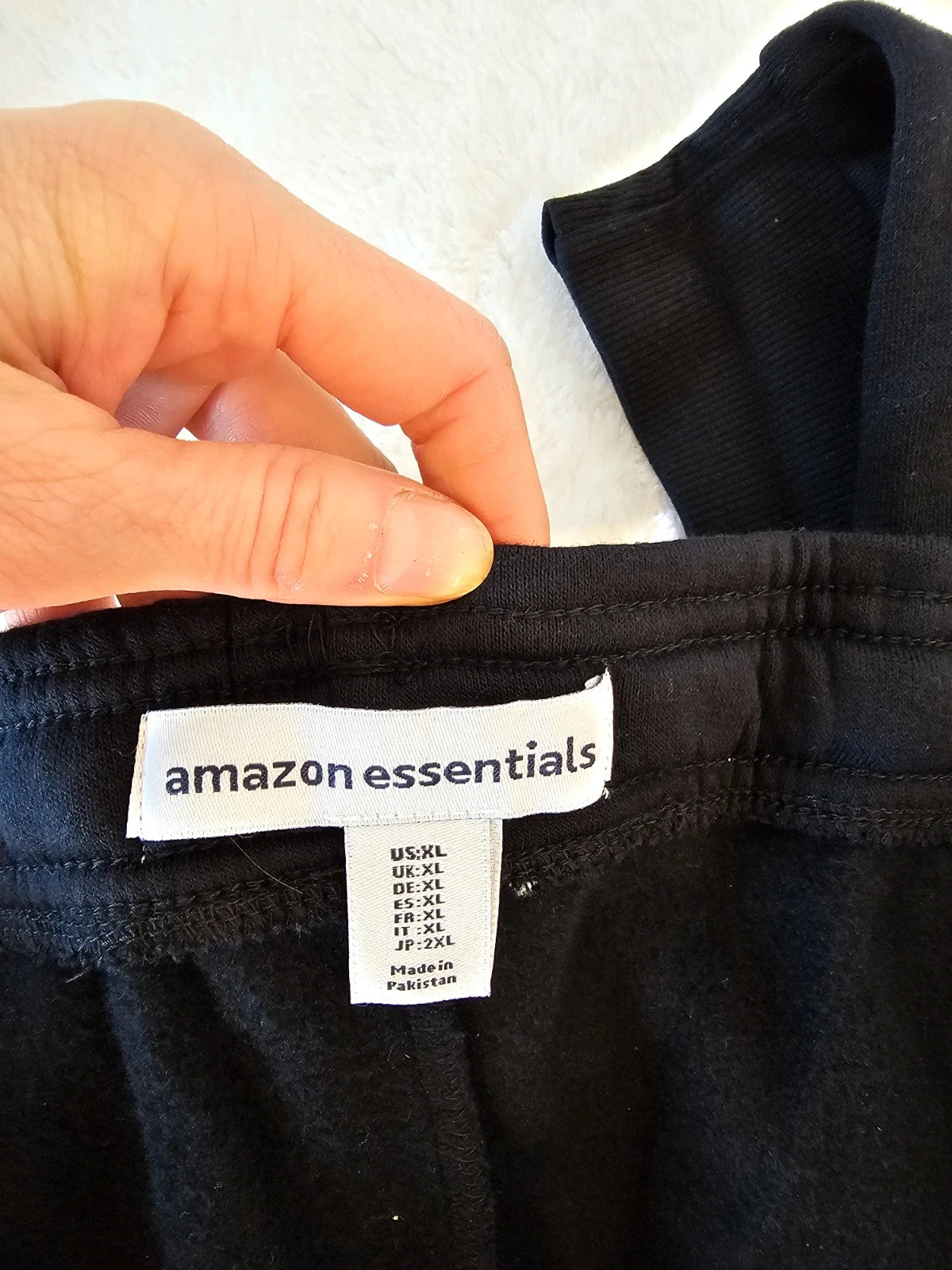 Amazon Essentials black joggers cotton blend with elastic waistband and side pockets.