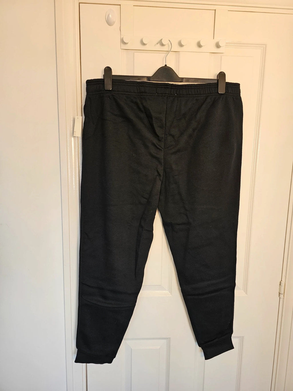Amazon Essentials black joggers cotton blend with elastic waistband and side pockets.